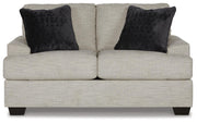 Ashley Furniture Vayda living room set with sofa, loveseat, and armchair in a modern design, shown from a head-on angle.