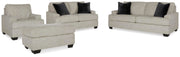 Ashley Furniture Vayda living room set with sofa and loveseat in a modern design, featuring neutral upholstery and sleek wood accents.