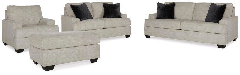 Ashley Furniture Vayda living room set with sofa and loveseat in a modern design, featuring neutral upholstery and sleek wood accents.