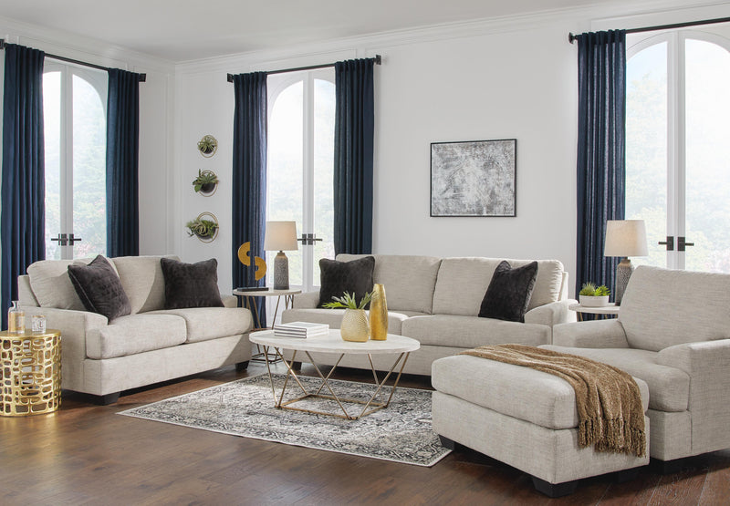 Ashley Furniture Vayda Living Room Set with sofa and armchair featuring neutral fabric and modern design.