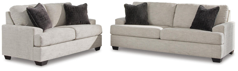 Ashley Furniture Vayda living room set with sofa and armchair in a modern design, featuring neutral fabric upholstery.