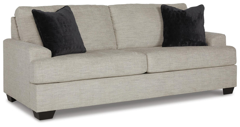 Ashley Furniture Vayda living room set featuring a sofa, loveseat, and armchair with neutral fabric and modern design.