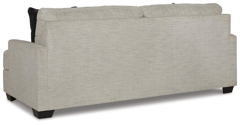 Ashley Furniture Vayda living room set featuring a sofa and armchair with neutral upholstery and modern design.
