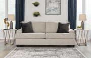 Ashley Furniture Vayda living room set with beige upholstered sofa and matching armchair in a modern design.