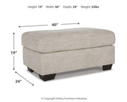 Ashley Vayda living room set featuring a sofa and loveseat with neutral fabric and modern design, perfect for contemporary home decor.