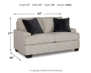 Ashley Furniture Vayda living room set with sofa and armchair, featuring neutral fabric and modern design.