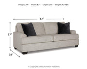 Ashley Furniture Vayda living room set with sofa and armchair in a modern, stylish design, featuring neutral fabric upholstery.