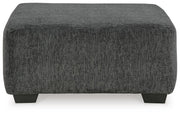 Ashley Furniture Biddeford living room set with a sofa and loveseat, featuring neutral upholstery and modern design.