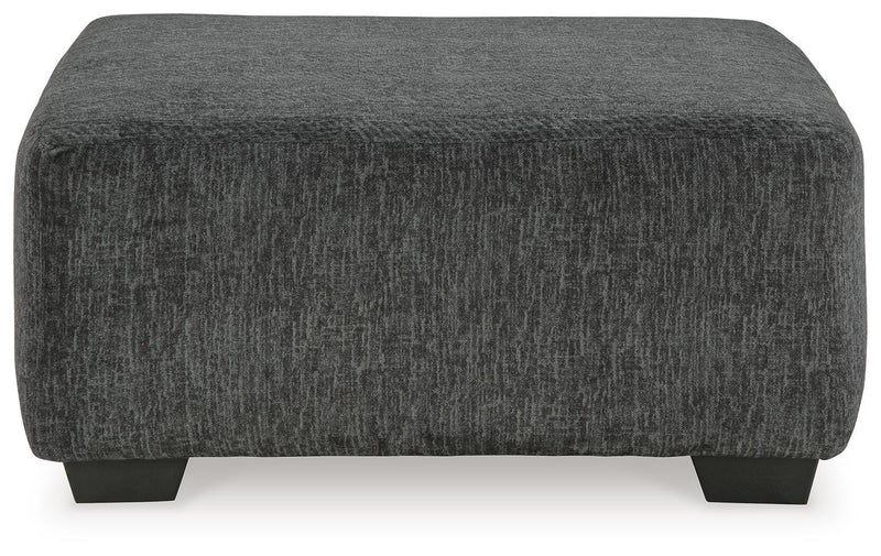 Ashley Furniture Biddeford living room set with a sofa and loveseat, featuring neutral upholstery and modern design.