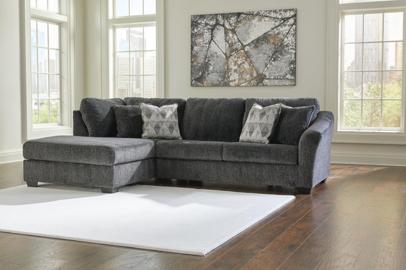 Ashley Furniture Biddeford living room set with sofa and loveseat in neutral upholstery, arranged in a cozy, modern living space.