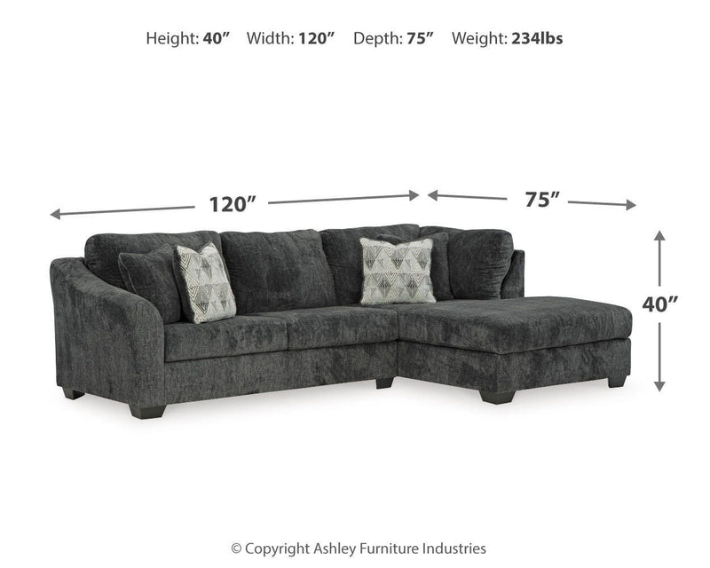 Ashley Furniture Biddeford living room set with sofa and loveseat, featuring plush upholstery and wooden legs.