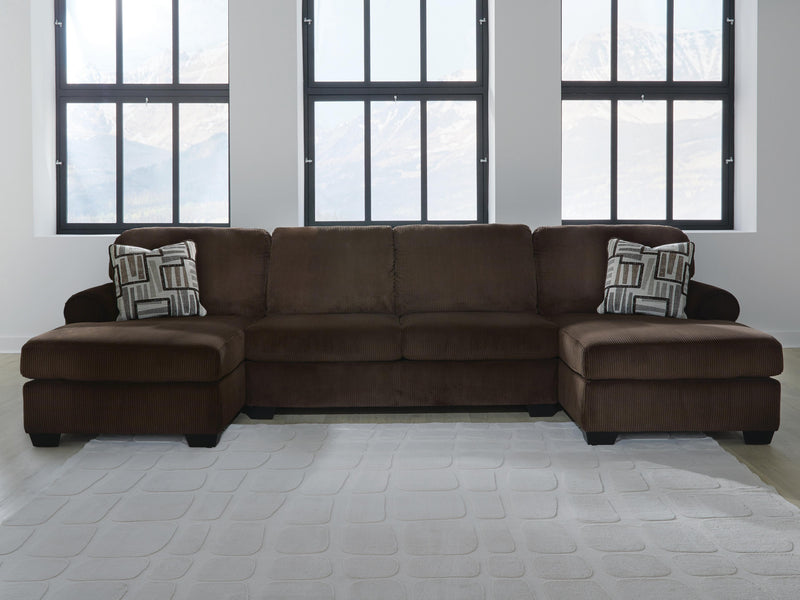 Ashley Furniture Kimlee sectional with double chaise, showing a modern fabric sectional sofa with multiple seating sections and a double chaise.