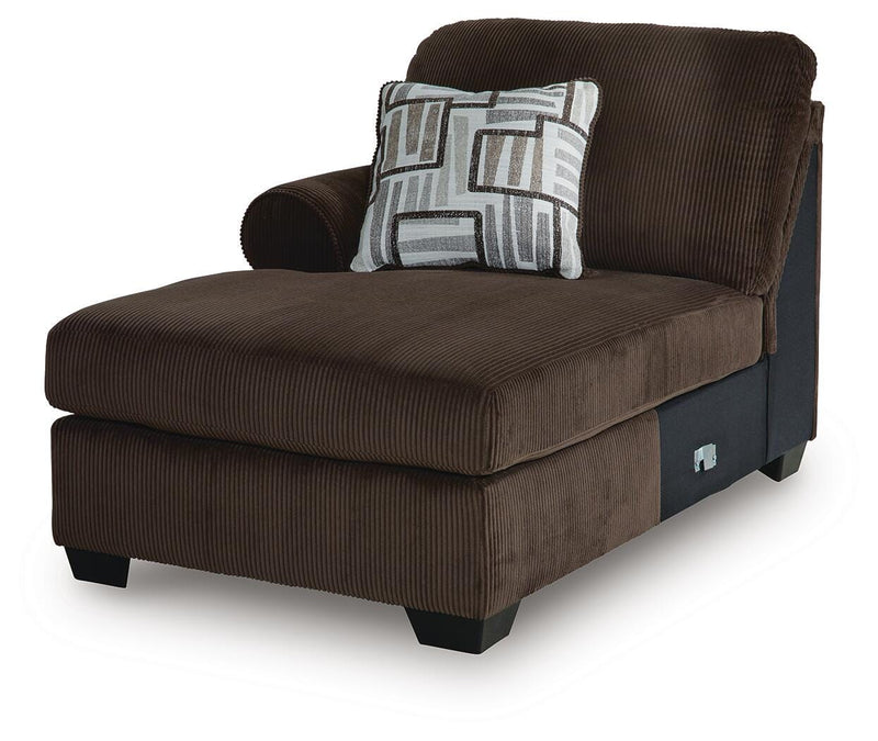 Ashley Furniture Kimlee sectional with chaise, featuring plush upholstery, modern design, and a spacious seating arrangement.