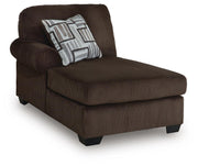 Ashley Furniture Kimlee sectional with chaise showing a modern fabric sofa with a spacious chaise lounge and plush cushions.