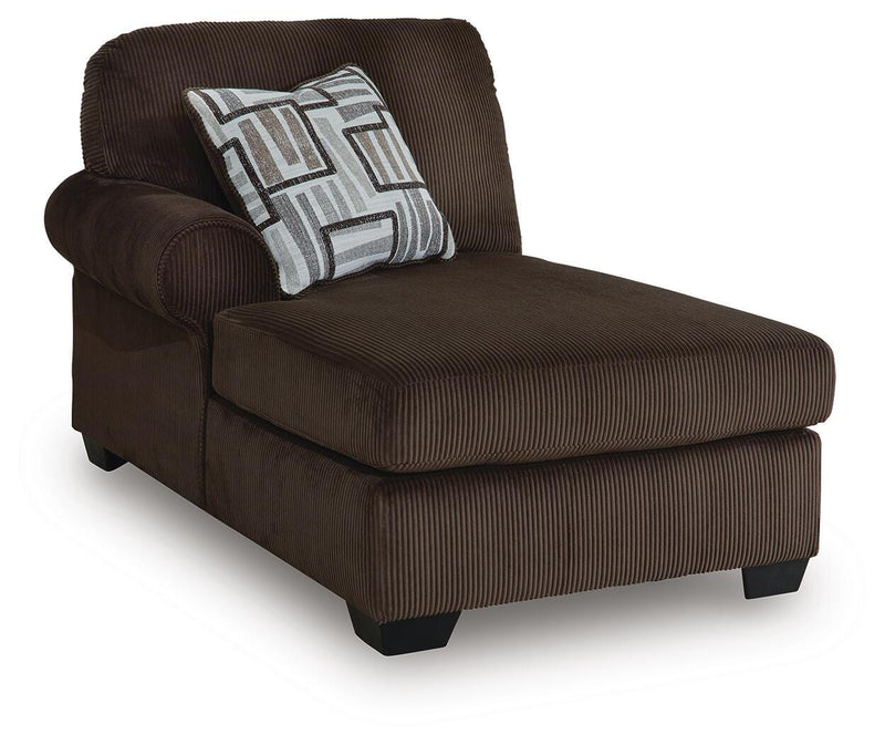 Ashley Furniture Kimlee sectional with chaise showing a modern fabric sofa with a spacious chaise lounge and plush cushions.