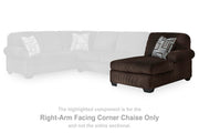 Ashley Furniture Kimlee sectional with chaise, showcasing plush fabric, modern design, and spacious seating in a stylish living room setting.