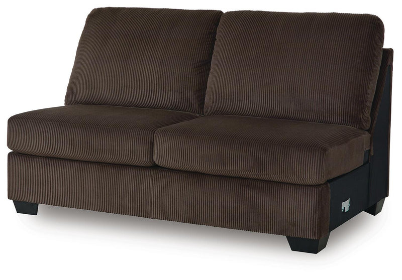 Ashley Furniture Kimlee sectional with chaise, featuring plush fabric, modern design, and multiple seating areas in a stylish living room setting.