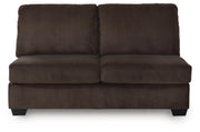 Ashley Furniture Kimlee sectional with chaise, beige fabric, plush cushions, and modern design, shown from a head-on angle.
