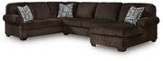 Ashley Furniture Kimlee sectional with chaise, featuring plush fabric upholstery and a modern design in a neutral color.