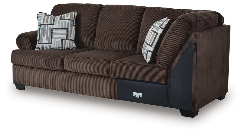 Ashley Furniture Kimlee sectional with chaise, showing a modern fabric sofa with a comfortable chaise lounge in a living room setting.