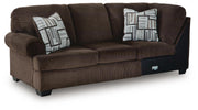 Ashley Furniture Kimlee sectional with chaise, showing a stylish fabric sofa with a built-in chaise lounge and modern design.