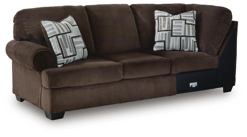 Ashley Furniture Kimlee sectional with chaise, showing a stylish fabric sofa with a built-in chaise lounge and modern design.