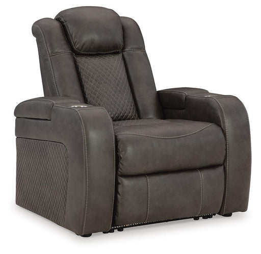 Ashley Furniture Fyne-Dyme power recliner in dark fabric, shown from an angled view with closed recline.