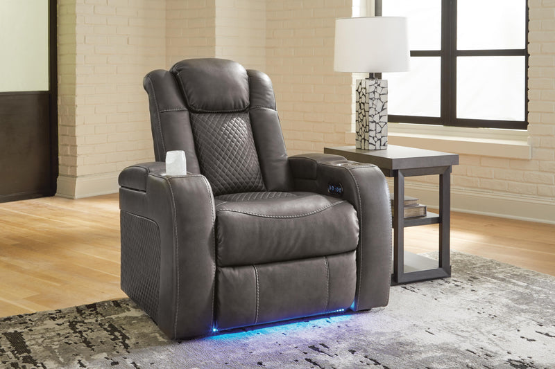 Ashley Furniture Fyne-Dyme Power Recliner in closed position, plush fabric upholstery, and padded armrests.