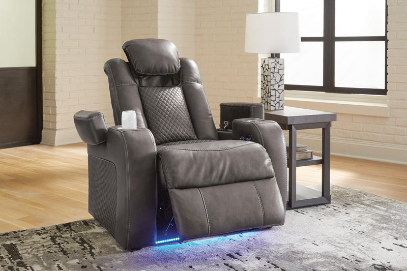 Ashley Furniture Fyne-Dyme Power Recliner in dark gray fabric with plush cushioning and built-in recline mechanism.