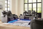 Ashley Furniture Fyne-Dyme living room set with a plush sofa and matching armchair, featuring neutral upholstery and modern design.