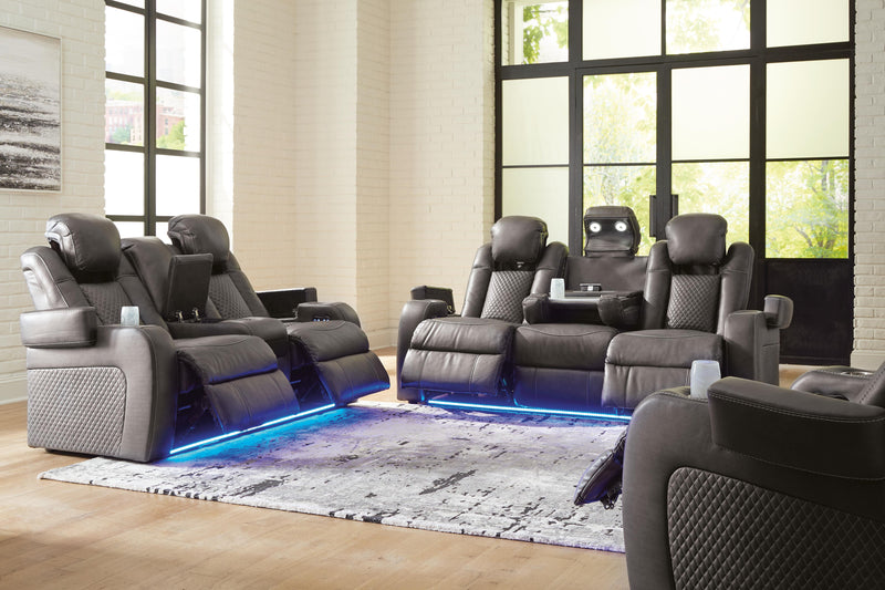 Ashley Furniture Fyne-Dyme living room set with a plush sofa and matching armchair, featuring neutral upholstery and modern design.