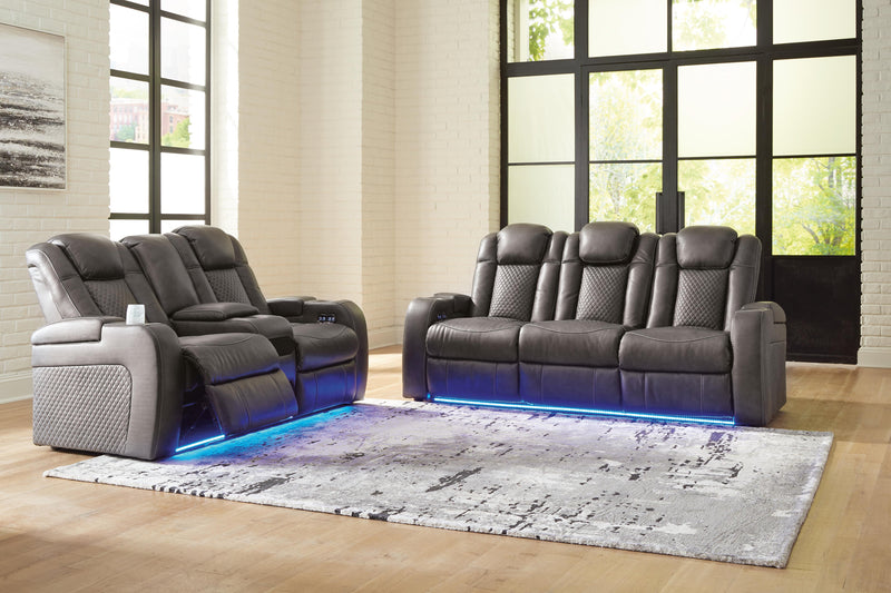 Ashley Furniture Fyne-Dyme living room set with sofa and armchair in a modern design, shown in a cozy living space.