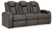 Ashley Furniture Fyne-Dyme power reclining sofa with plush cushions and reclining features, shown from an angle.