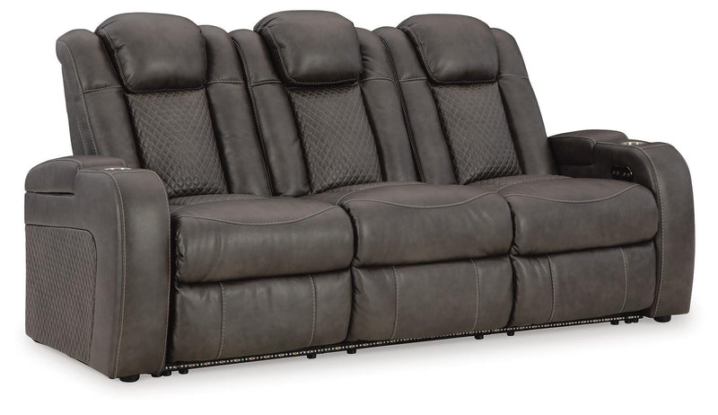 Ashley Furniture Fyne-Dyme power reclining sofa with plush cushions and reclining features, shown from an angle.