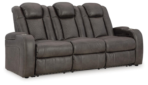Ashley Furniture Fyne-Dyme power reclining sofa with plush cushions and reclining features, shown from an angle.