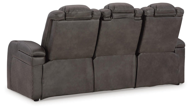 Ashley Furniture Fyne-Dyme power reclining sofa with plush fabric, featuring reclining seats and a supportive backrest.