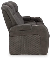 Ashley Furniture Fyne-Dyme Power Reclining Sofa with plush fabric and multiple reclining seats, shown from a side view.