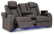 Ashley Furniture Fyne-Dyme Power Reclining Loveseat with Console, shown open with plush cushions and built-in cup holders.