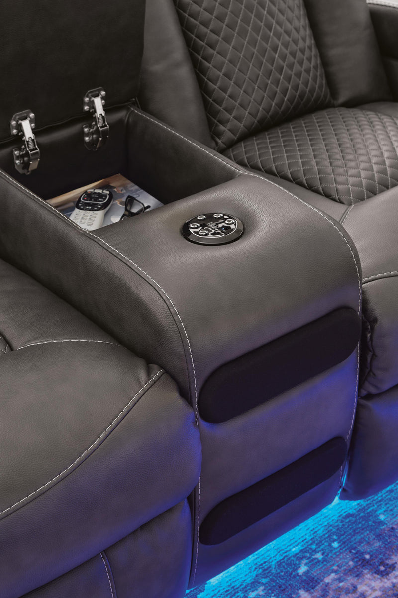 Ashley Furniture Fyne-Dyme Power Reclining Loveseat with console, showcasing plush fabric, built-in cup holders, and reclining features.