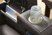 Close-up of the armrest and storage compartment of the Ashley Furniture Fyne-Dyme Power Reclining Sofa.