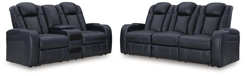 Ashley Furniture Fyne-Dyme living room set with a sleek sofa and matching armchair in a modern design.
