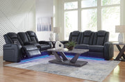 Ashley Furniture Fyne-Dyme living room set with sofa, loveseat, and coffee table in a modern design, shown in a cozy living space.