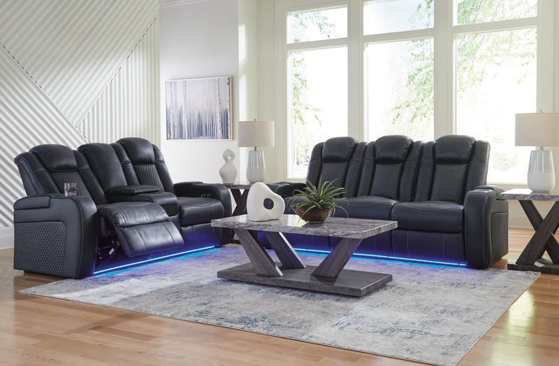 Ashley Furniture Fyne-Dyme living room set with sofa, loveseat, and coffee table in a modern design, shown in a cozy living space.