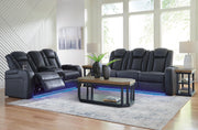 Ashley Furniture Fyne-Dyme living room set with a sofa and armchair featuring plush upholstery and wooden legs.