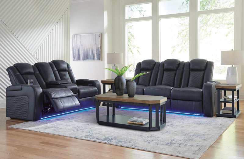 Ashley Furniture Fyne-Dyme living room set with a sofa and armchair featuring plush upholstery and wooden legs.