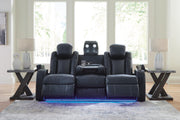 Ashley Furniture Fyne-Dyme Power Reclining Sofa with plush cushions and reclining features, shown in a modern living room setting.