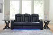 Ashley Furniture Fyne-Dyme Power Reclining Sofa with plush cushions and reclining features, shown in a modern living room setting.