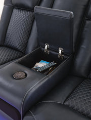 Ashley Furniture Fyne-Dyme power reclining loveseat with console, featuring plush upholstery and built-in cup holders.