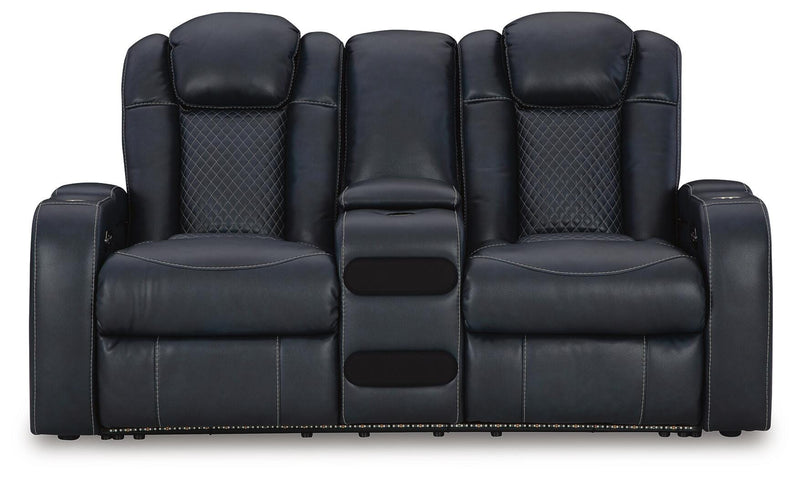 Ashley Furniture Fyne-Dyme power reclining loveseat with console, showing plush fabric, reclining mechanism, and built-in storage armrest.