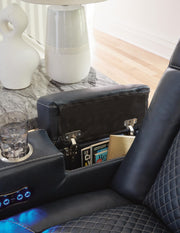 Ashley Furniture Fyne-Dyme Power Reclining Sofa with arm storage, featuring plush cushions and a modern design.